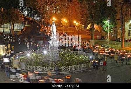 France, Hautes-Pyrénées, Lourdes, torchlight procession on the Rosary esplanade Stock Photo