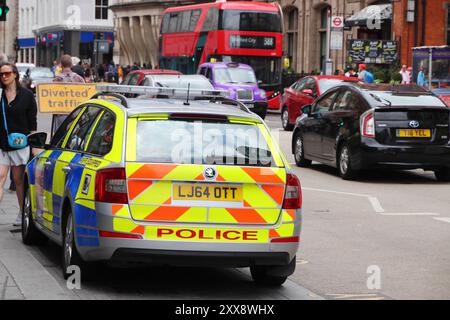 LONDON, UK - JULY 13, 2019: Police car in the City of London. Metropolitan Police Service has 31,000 police officers in Greater London area. Stock Photo