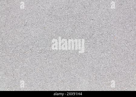 Road surface background. Asphalt bright grey blacktop road texture. Stock Photo
