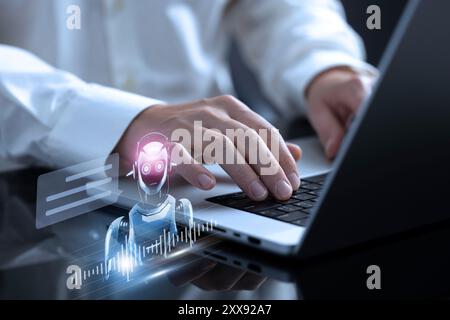 A person interacts with an online customer service chatbot, seeking assistance and information. The chatbot, powered by AI, engages in a natural langu Stock Photo