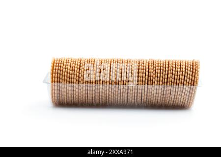 Thin  cracker cookies in plastic pack isolated on white Stock Photo