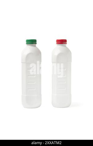 White plastic bottled with a red and green lids on a white background with copy space Stock Photo