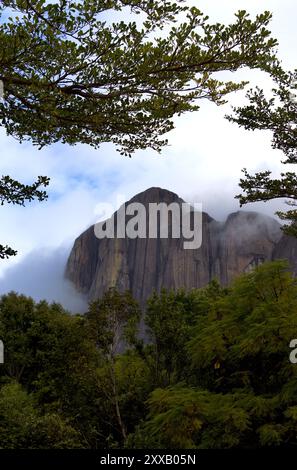 Gratine wall through natural 'window', Tsaranoro Reserve, Madagascar Stock Photo