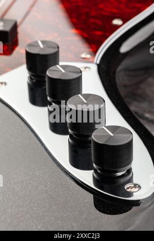 bass guitar preamp knobs macro closeup Stock Photo