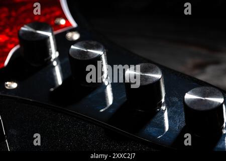 bass guitar preamp knobs macro closeup Stock Photo