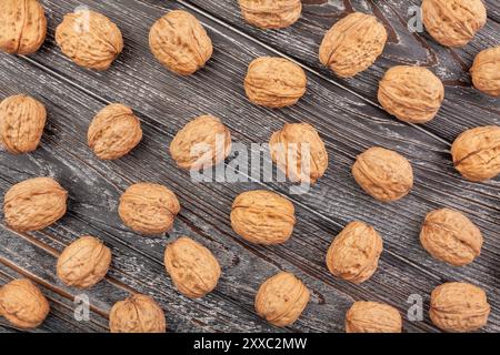 walnuts on wood background top view Stock Photo