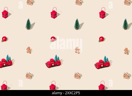 Trendy Christmas pattern made with various winter and New Year objects on pastel cream background. Minimal Christmas concept. Festive holiday pattern Stock Photo