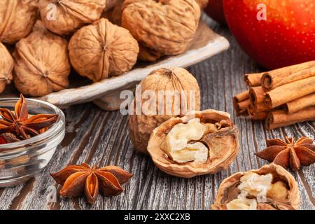 sliced walnuts group on wood background Stock Photo