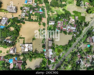 Dhaka, Bangladesh. 23rd Aug, 2024. An aerial view shows flooded villages in the Mohipal, area of Feni district in Chittagong division, Bangladesh, on August 23, 2024. At least 13 people are killed; a total of 43 upazilas in several districts are affected by the flash floods, and about 189,663 families are marooned. Credit: SOPA Images Limited/Alamy Live News Stock Photo