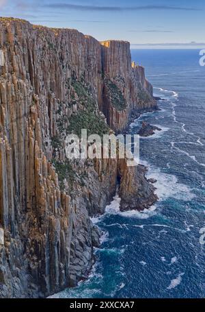 Portrait image of dolerite column sea cliffs and ocean at Cape Raoul, Tasman National Park, Tasman peninsula, Tasmania Stock Photo