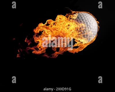 Close up of a burning golf ball flying on a black background Stock Photo