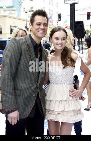 HOLLYWOOD, CA, JUNE 12, 2011: Jim Carrey and Madeline Carroll at the Los Angeles premiere of 'Mr. Popper's Penguins' held at the Grauman's Chinese The Stock Photo