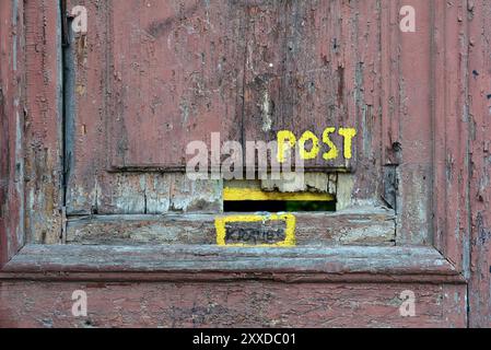 Letterbox on an abandoned old condemned house in Magdeburg Stock Photo