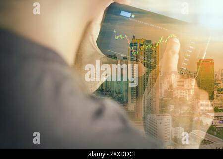 Double exposure, macro close up a man checking stock market on tablet, smartphone Stock Photo