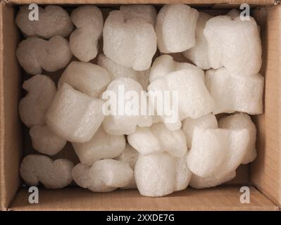 Close up of a cardboard box with styrofoam fill, protection concept Stock Photo