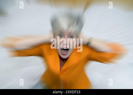 Woman in panic Stock Photo