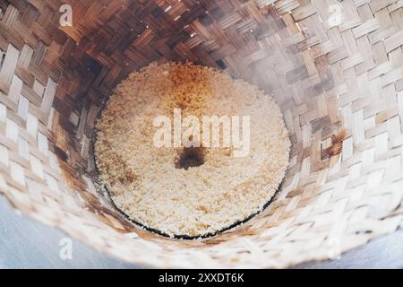 Close up portrait of traditional Indonesian cuisine named tiwul making progress. Stock Photo