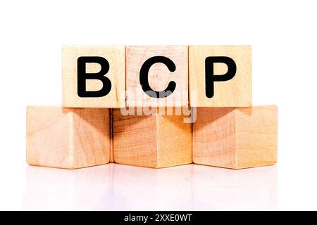 BCP Business Continuity Plan. BCP on wooden cubes on a white background. Stock Photo
