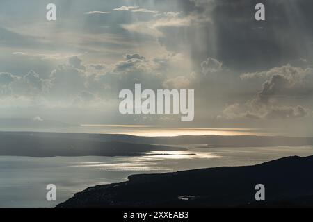 Dramatic clouds in a sunset storm over the Croatian Adriatic coast. Stock Photo