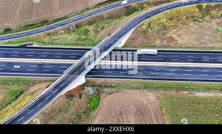 Arial view of Modern transportation with Expressway Road highway Top view. Important infrastructure. Stock Photo