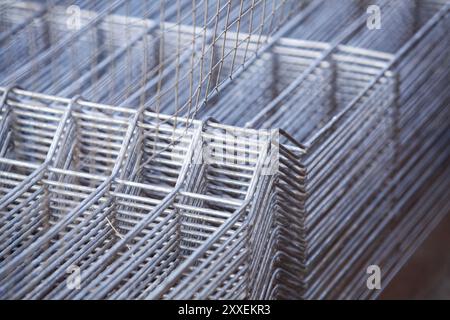 Gitter mesh stock close-up. Metal products selective focus. Stock Photo