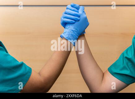 Healthcare team working in hospital office or clinic with other doctors or nurses. Collaboration between health professionals Stock Photo