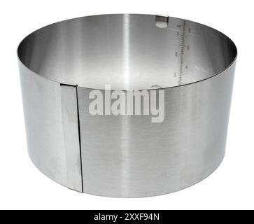 Round metal sliding baking pan on white background. Baking Stock Photo
