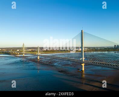 Aerial, The Mersey Gateway Bridge and Silver Jubilee Bridge span the Mersey estuary, Runcorn, Cheshire, England Stock Photo