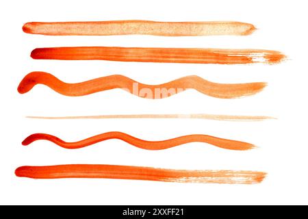 Collection of various orange paint brush strokes on white background Stock Photo