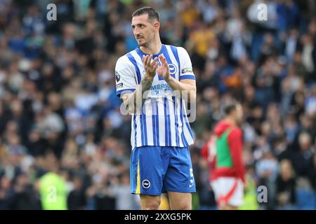 Lewis Dunk in action for Brighton & Hove Albion at the AMEX Stadium Stock Photo