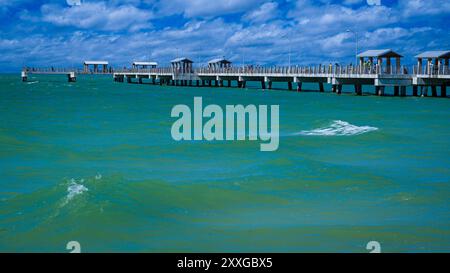 Fort De Soto Park, Florida, USA — February 17, 2017. Photo of a fishing pier jutting out to sea in Fort De Soto Park, Florida. Stock Photo