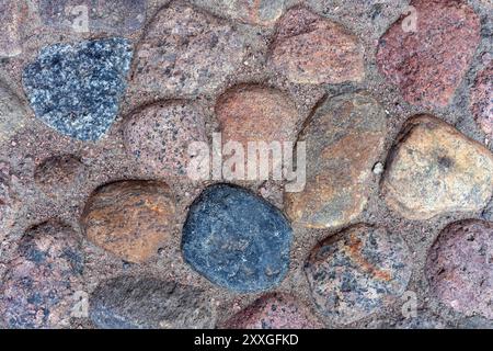Seamless stonework texture from natural multi-colored stone of various sizes. Stock Photo