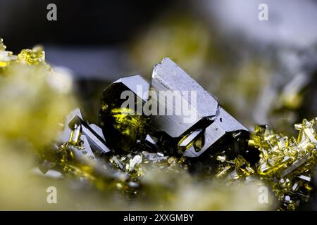 Dark green Epidote cluster, specimen from Turkey. Micro photography extreme close-up. microscope mineral crystal photography for Scientific use. Stock Photo