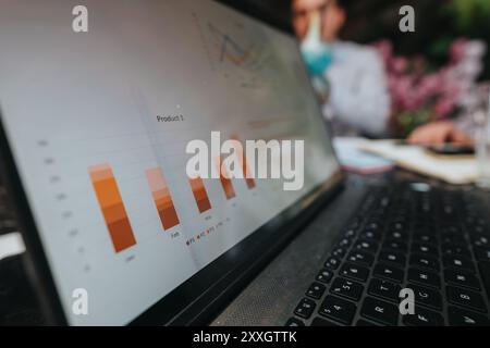 Close-up of laptop screen displaying business analytics chart Stock Photo