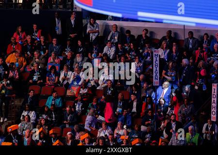 Chicago, USA. 20th Aug, 2024. Michigan House Speaker Joe Tate, D-Detroit, is seen in a spotlight in the audience during the second day of the Democratic National Convention in Chicago, Ill., on Aug. 20, 2024. (Photo by Andrew Roth/Sipa USA) Credit: Sipa USA/Alamy Live News Stock Photo