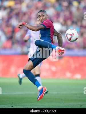 Barcelona, Spain. 24th Aug, 2024. Raphinha of Barcelona shoots during the La Liga football match between FC Barcelona and Athletic Club in Barcelona, Spain, on Aug. 24, 2024. Credit: Joan gosa/Xinhua/Alamy Live News Stock Photo