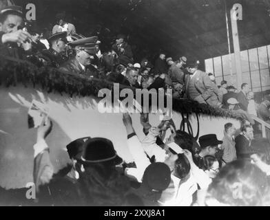 Adolf Hitler and Josef Goebbels sign autographs for members of the Canadian figure skating team at the 1936 Olympics. Stock Photo