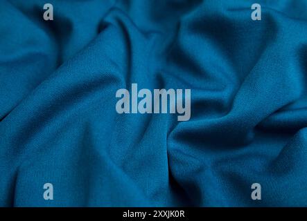 Blue fabric background. Selective focus. Stock Photo