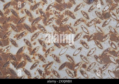 Rust Metal steel plate texture flooring background diamond grey pattern worn out surface Stock Photo