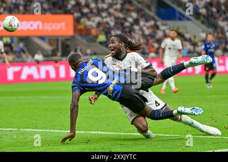 Milano, Italy. 24th Aug, 2024. Marcus Thuram (9) of Inter and Kialonda Gaspar (4) of Lecce seen during the Serie A match between Inter and Lecce at Giuseppe Meazza in Milano. Credit: Gonzales Photo/Alamy Live News Stock Photo