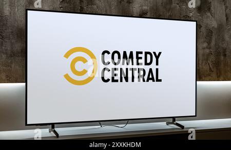 POZNAN, POL - DEC 19, 2023: Flat-screen TV set displaying logo of Comedy Central, an American basic cable channel owned by ViacomCBS Stock Photo