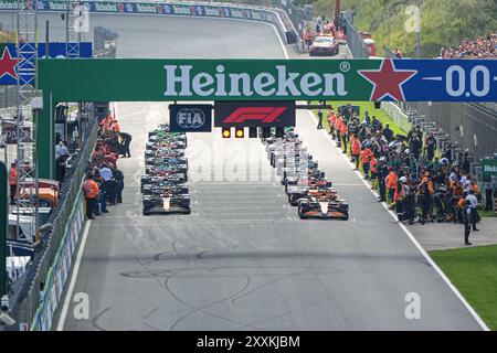 ZANDVOORT, NETHERLANDS - AUGUST 25: Max Verstappen of Red Bull Racing, Lando Norris of McLaren, Charles Leclerc of Ferrari, Lewis Hamilton of Mercedes, Carlos Sainz of Ferrari, Oscar Piastri of McLaren, Sergio Perez of Red Bull Racing, George Russell of Mercedes, Fernando Alonso of Aston Martin, Lance Stroll of Aston Martin, Nico Hulkenberg of Haas, Yuki Tsunoda of RB, Daniel Ricciardo of RB, Oliver Bearman of Ferrari, Pierre Gasly of Alpine, Kevin Magnussen of Haas, Esteban Ocon of Alpine, Alexander Albon of Williams, Zhou Guanyu of Kick Sauber, Logan Sargeant of Williams, Valtteri Bottas of Stock Photo