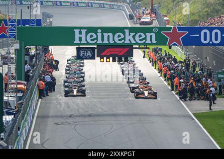 ZANDVOORT, NETHERLANDS - AUGUST 25: Max Verstappen of Red Bull Racing, Lando Norris of McLaren, Charles Leclerc of Ferrari, Lewis Hamilton of Mercedes, Carlos Sainz of Ferrari, Oscar Piastri of McLaren, Sergio Perez of Red Bull Racing, George Russell of Mercedes, Fernando Alonso of Aston Martin, Lance Stroll of Aston Martin, Nico Hulkenberg of Haas, Yuki Tsunoda of RB, Daniel Ricciardo of RB, Oliver Bearman of Ferrari, Pierre Gasly of Alpine, Kevin Magnussen of Haas, Esteban Ocon of Alpine, Alexander Albon of Williams, Zhou Guanyu of Kick Sauber, Logan Sargeant of Williams, Valtteri Bottas of Stock Photo