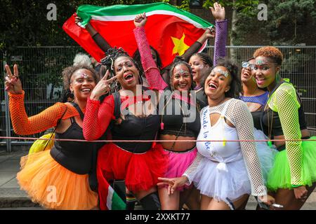 London, UK. 25th Aug, 2024. A hen party celebrates at the carnival. Notting Hill Carnival Sunday starts with the traditional Children's Carnival and a family orientated carnival parade. Revellers celebrate this Bank Holiday Weekend participating or watching along the carnival route, at sounds systems, stalls and venues on the first of two days of Notting Hill Carnival festivities. Credit: Imageplotter/Alamy Live News Stock Photo