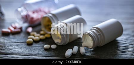 Containers with pills. Addictive substances. Stock Photo