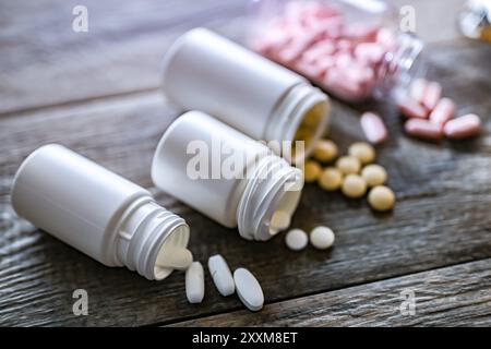 Containers with pills. Addictive substances. Stock Photo