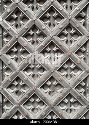 Detail texture of old medieval decorated wooden door Stock Photo