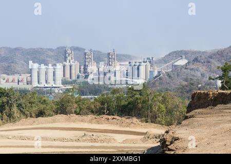 Cement factory located in the mountains Stock Photo