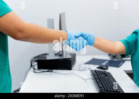 Healthcare team working in hospital office or clinic with other doctors or nurses. Collaboration between health professionals Stock Photo