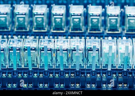 Close up Relay actuators inside the Industrial power case Stock Photo